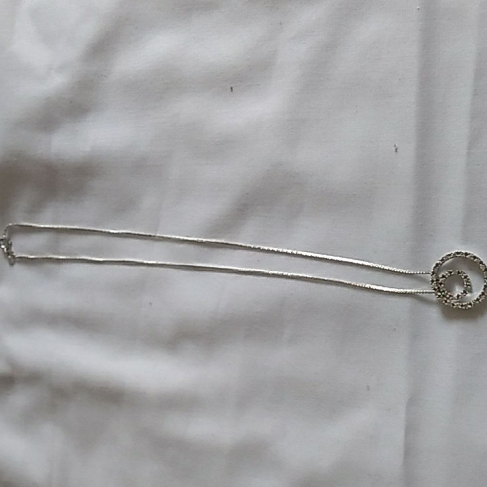 A STERLING SILVER CZ CONCENTRIC CIRCLE PENDANT AND NECKLACE 16". NWOB.SB.36